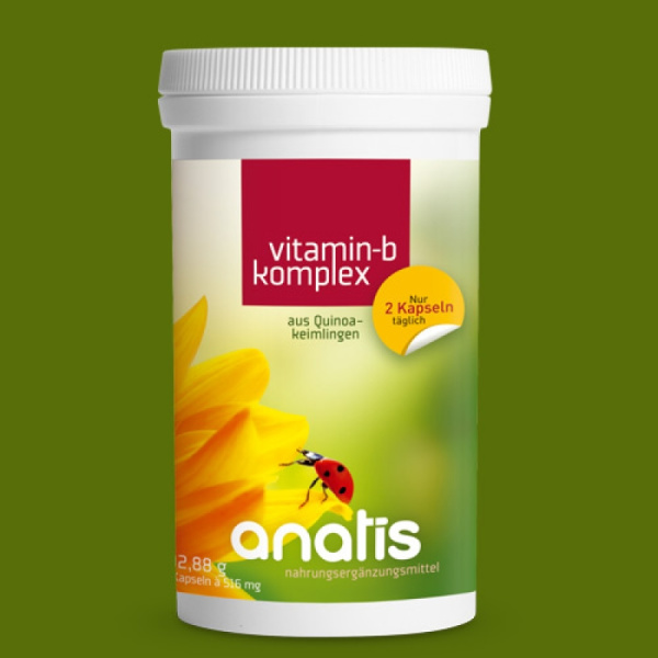 Weiße Zuckerrohr‑Dose mit grün‑gelbem Etikett des Nahrungsergänzungsmittels ‚anatis Vitamin‑B‑Komplex‘ aus Quinoakeimlingen, mit rotem Schriftfeld und Marienkäfer‑Logo, Produktname und Hinweis ‚Nur 2 Kapseln täglich‘.
